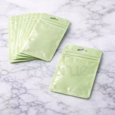 Zippåsar i pastellgrön blixtlåspåse 10x7,5cm 10st