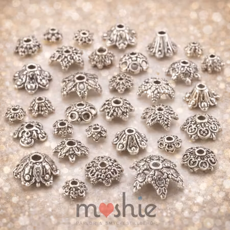 Pärlhattar med blommor i antik silver mix 4-17mm 100st