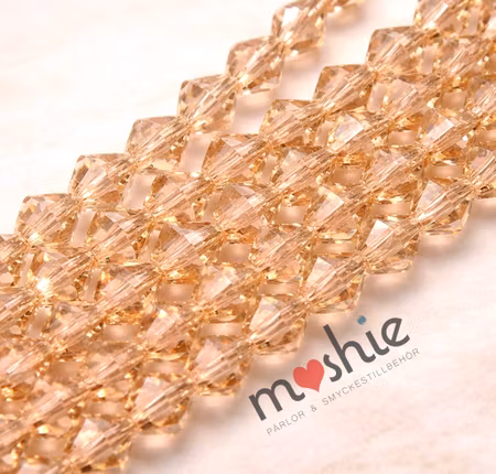 Fasetterad kristallimitation av glas Bicone dark champagne 4mm 85st