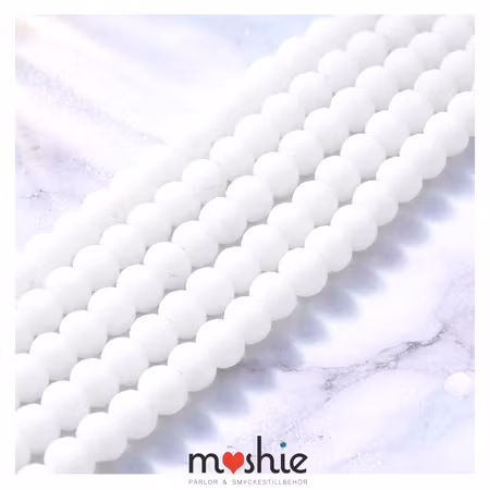 Fasetterade matta frostade glasrondeller snow 6x4,5mm 85st