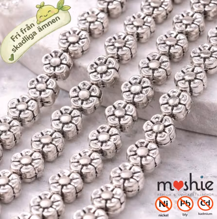 Sträng med 5,5mm nickelfria blommor av Blandmetall 47st