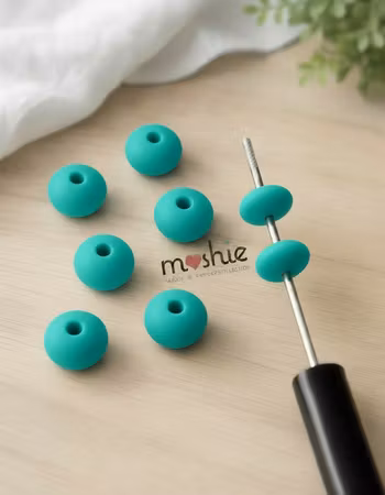 Rondeller av silikon turkos 12mm 10st