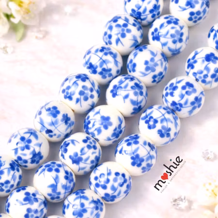 Handgjorda porslinspärlor på sträng Blue Floral i tidlös design 8mm 42st