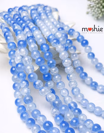 Glaspärlor på sträng 8mm dovt krackelerad cloudy sky 104 st