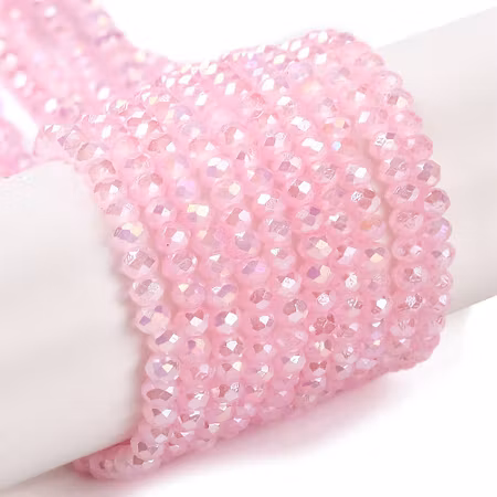 Fasetterade rondeller av glas rosa glimmer 3x2mm 135st