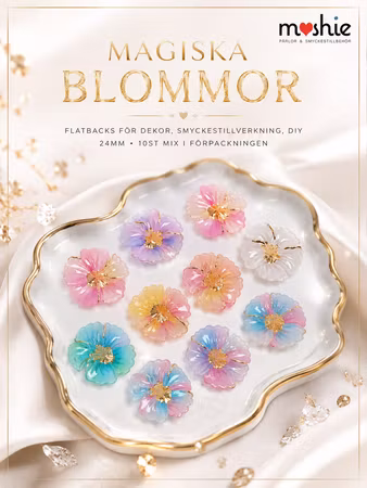 Blommor av resin med gulddetaljer 24mm 10st