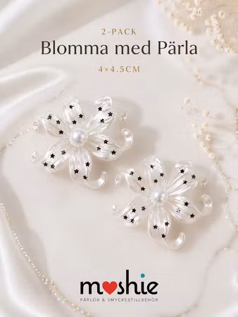 Stora kurviga blommor med pärla pärlemor vit med stjärna 2st