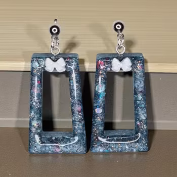 Söta örhängen med rosett