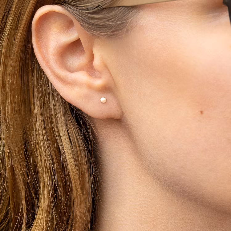 REA Örhängen 18k guld fram och Silver bak