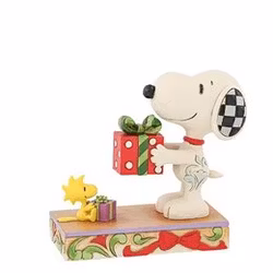 Snoopy og Woodstock bytter gaver.