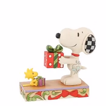 Snoopy og Woodstock bytter gaver.