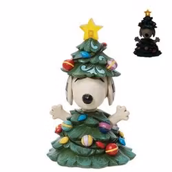 Snoopy kledd ut som juletre med lys i stjerne