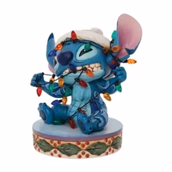 Stitch innviklet i julelys