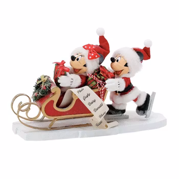 Mikke dytter Minni i slede.