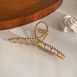 Guldfärgad hårklämma – Elegant Fjärilsformad Accessoar