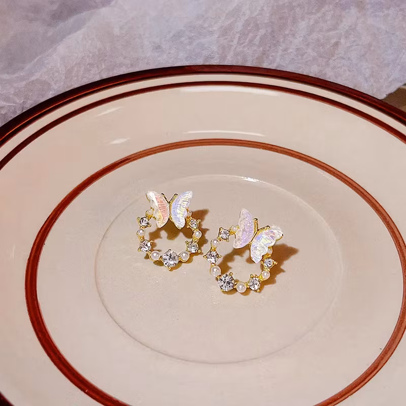 Orecchini a farfalla dorati con perle | Vestiti da donna hot