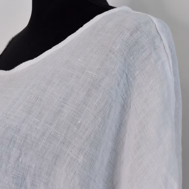 Linnetunika med volang VIT