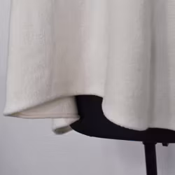 Stickad Ponchotröja ECRU