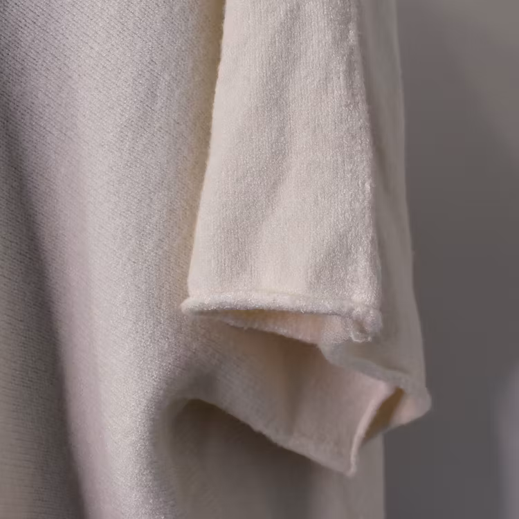 Stickad Ponchotröja ECRU