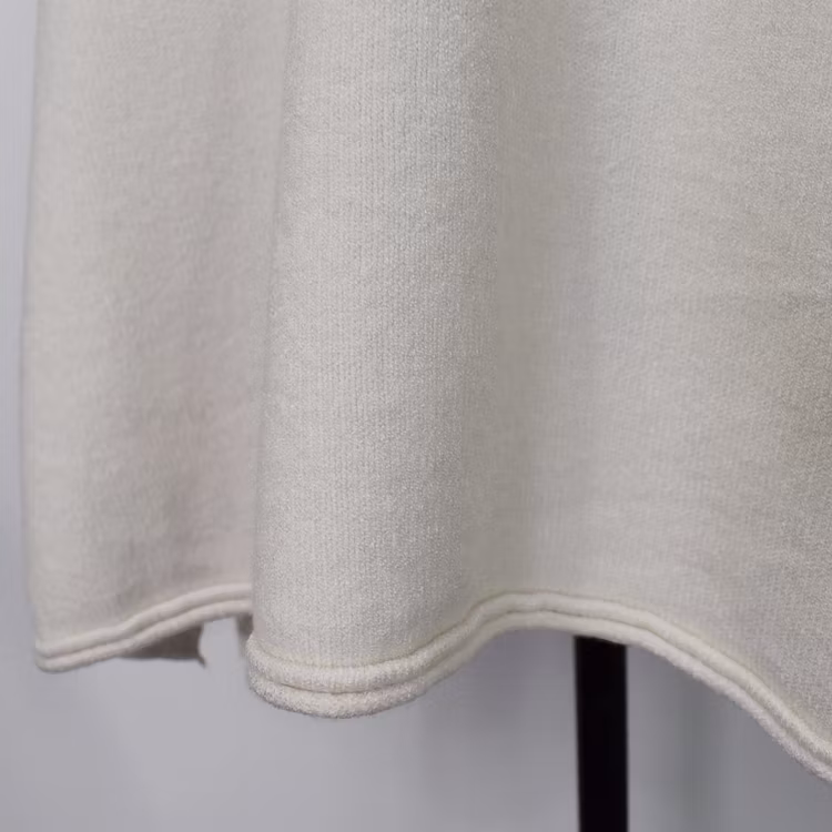 Stickad Ponchotröja med Knappar ECRU