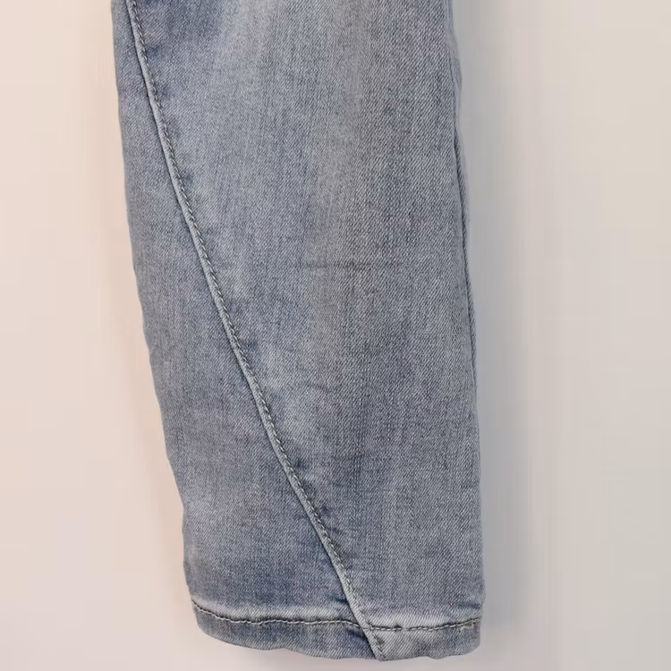 SECOND HAND Baggy Jeans LJUS BLÅ Storlek 34 - Place du Jour