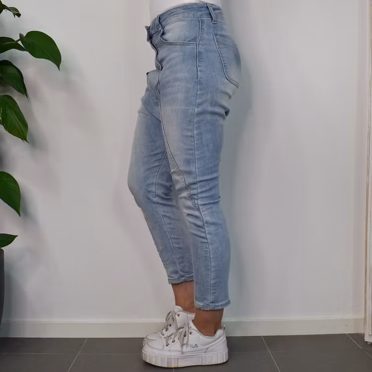 SECOND HAND Baggy Jeans LJUS BLÅ Storlek 34 - Place du Jour
