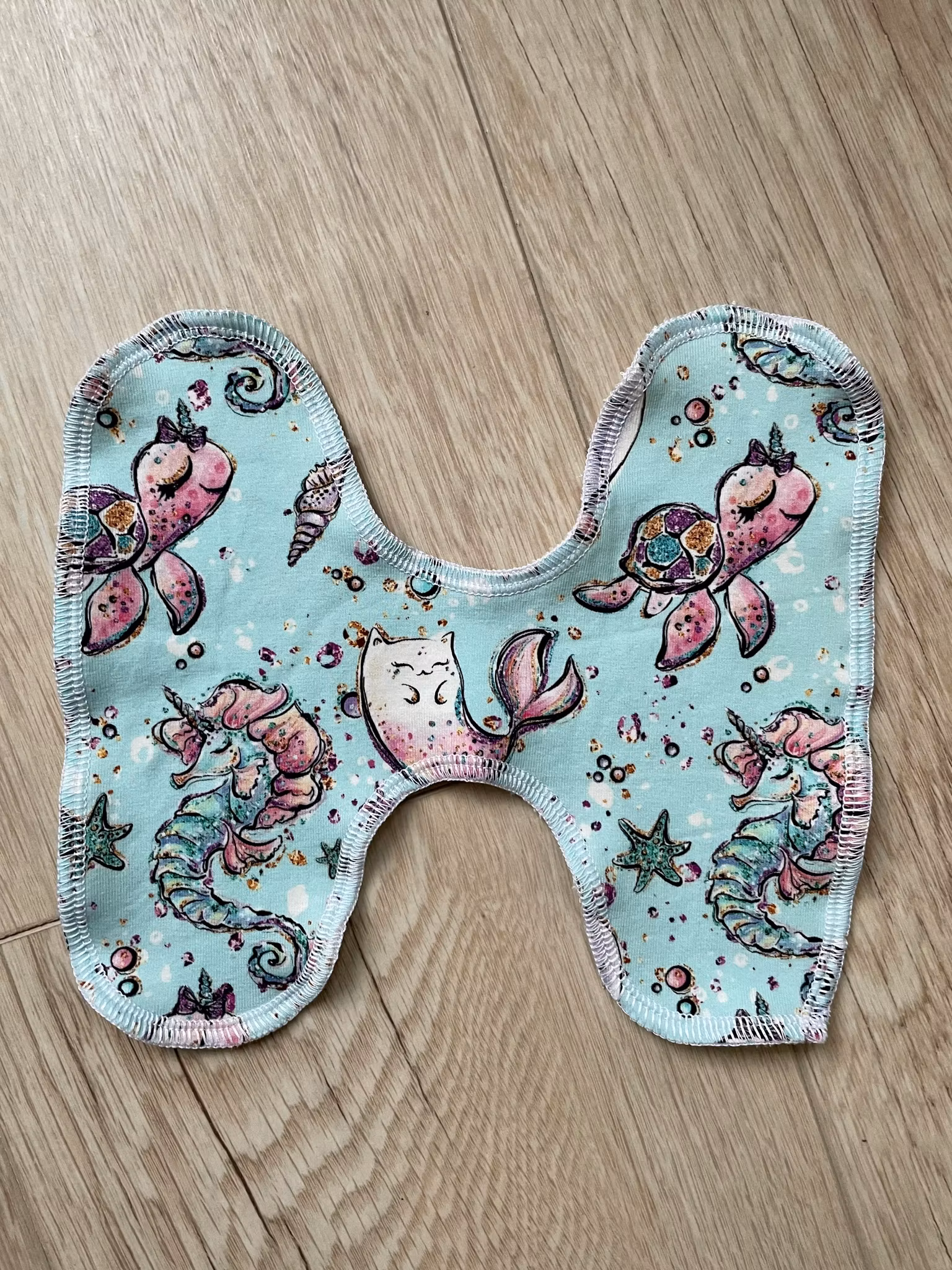 Trosskydd omlott med stickad bambu