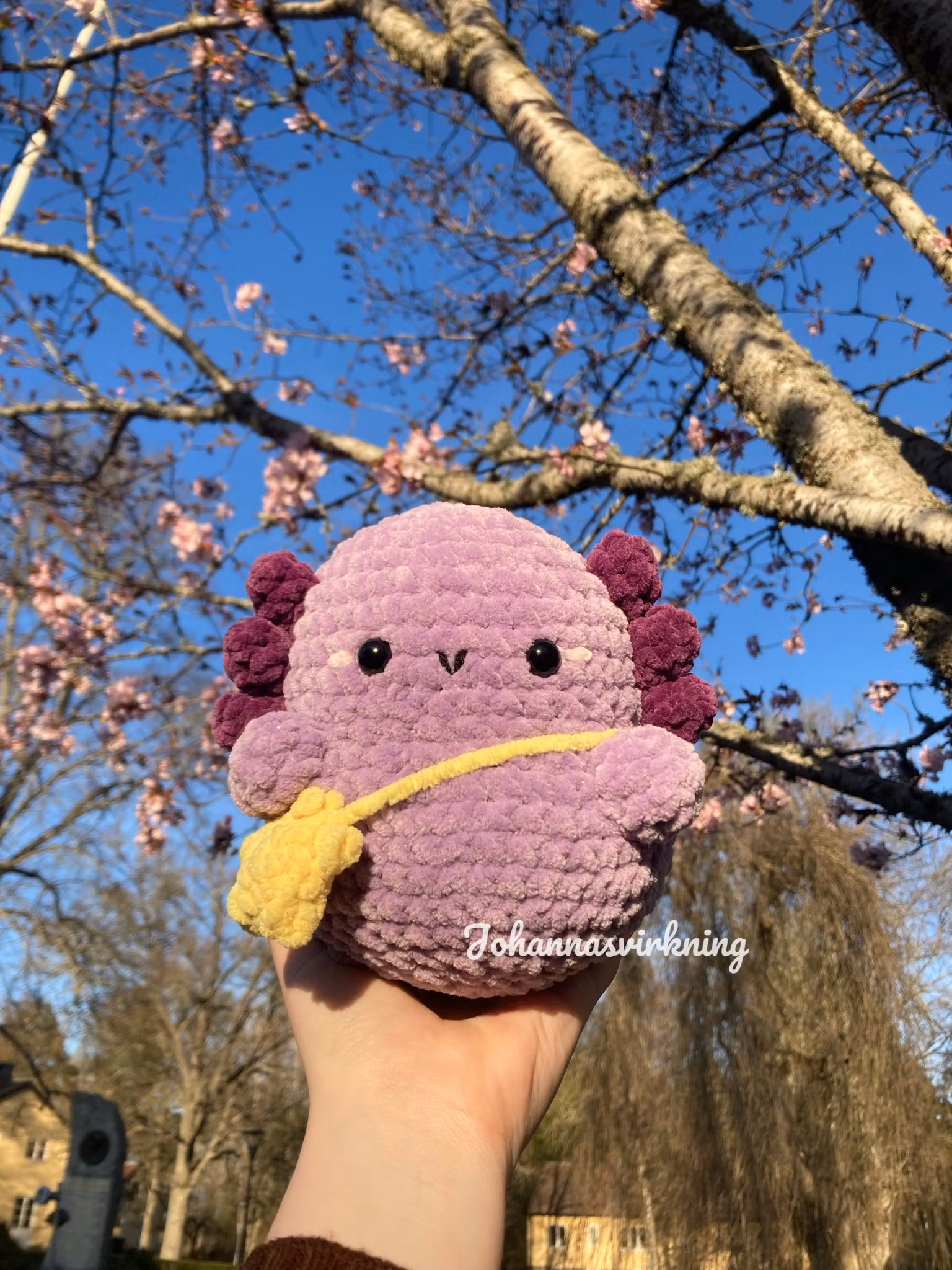 Glittrande axolotl