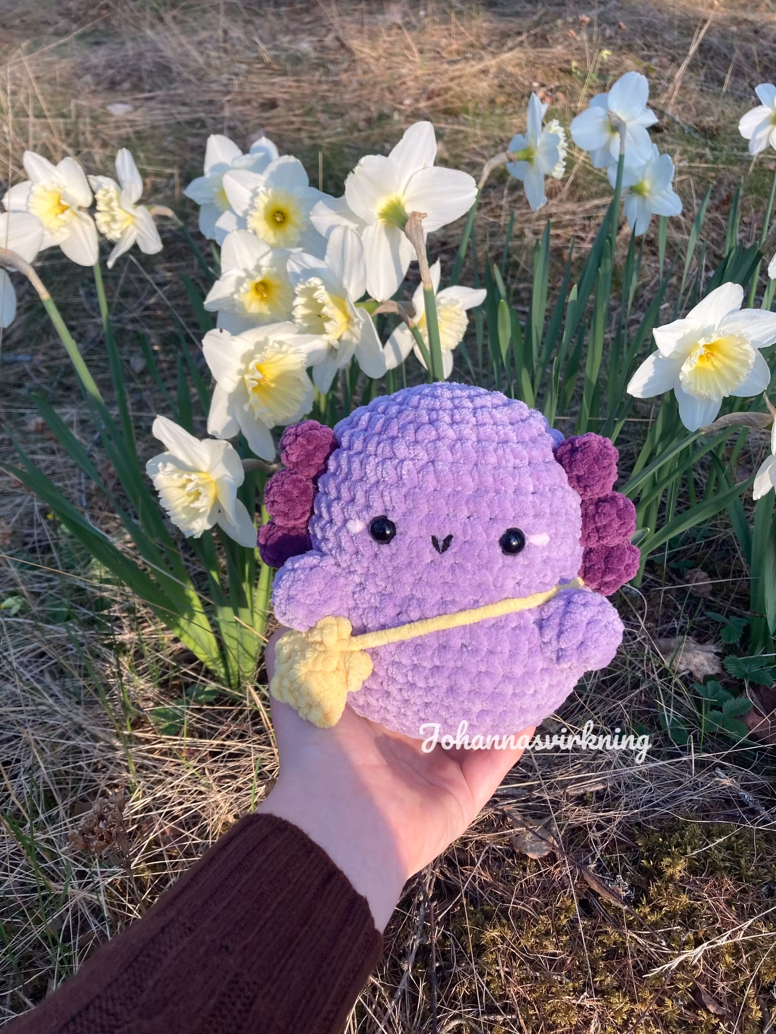 Glittrande axolotl