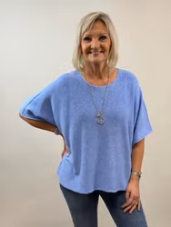 Nessa ponchotröja ljusblå