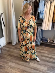 Sussi blommig klänning gul
