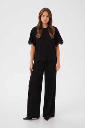 Umila topp svart