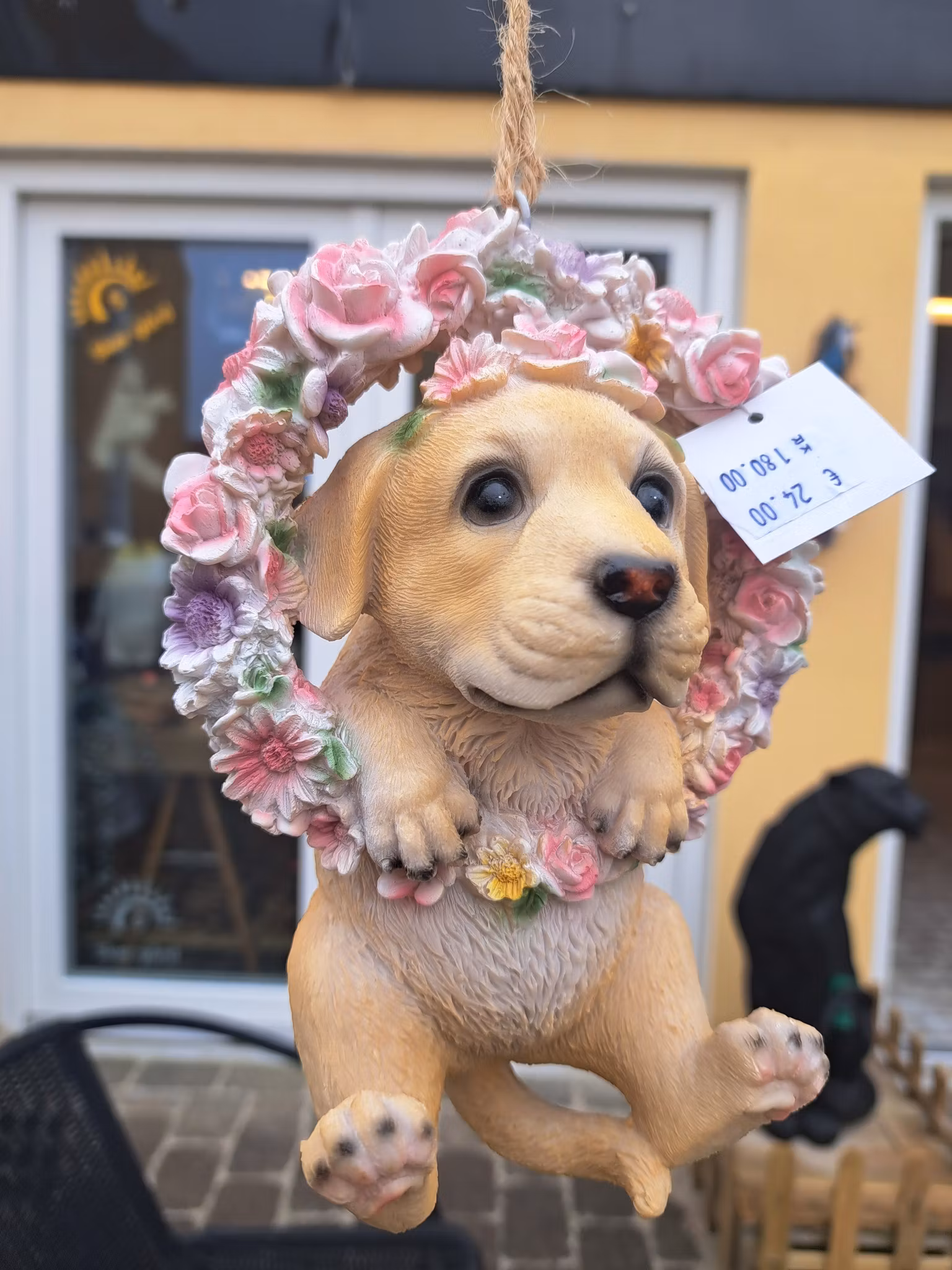 Blomsterkrans med hund