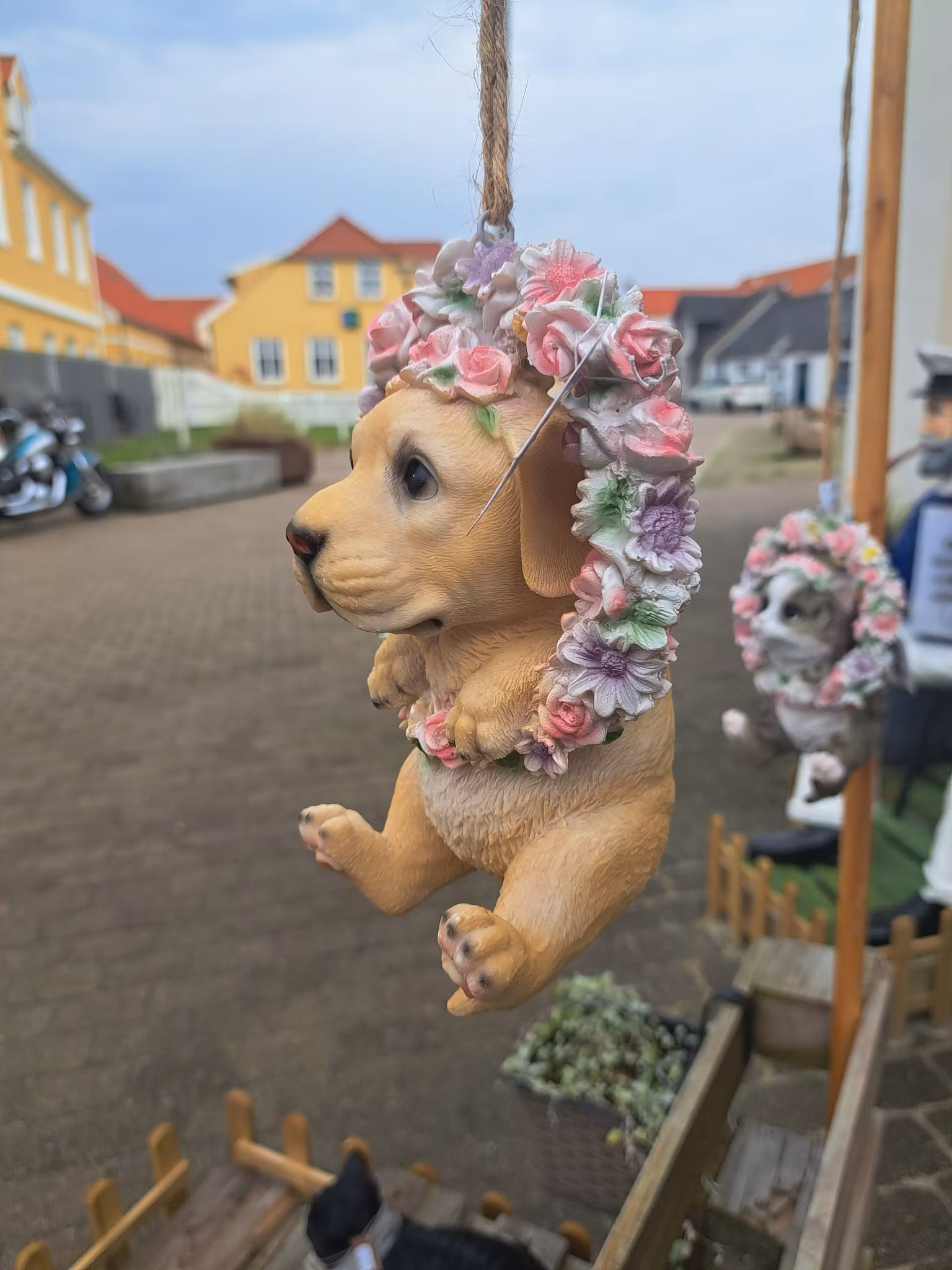 Blomsterkrans med hund