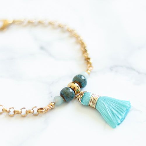 Stiligt Armband Med Turkos Tofs - Myntan M