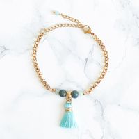 Stiligt Armband Med Turkos Tofs - Myntan M