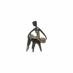 Ballerina sidder