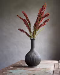 Gren med røde blomster