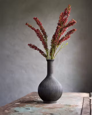 Gren med røde blomster