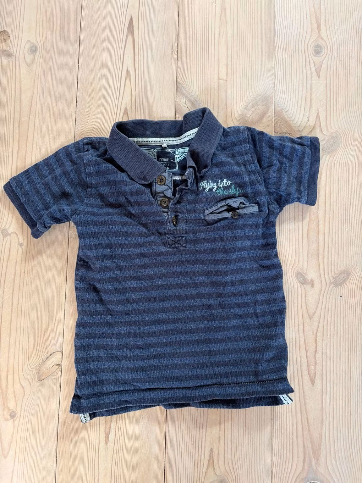 Poloshirt – forside fladt