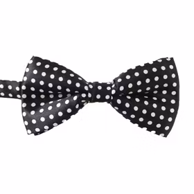 Svart fluga med vita prickar