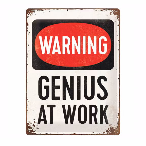 Plåtskylt - "Warning Genius at Work" 30x40 cm