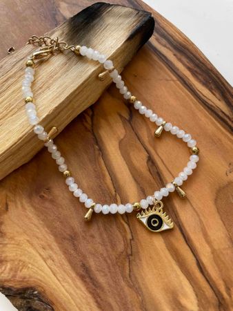 Fotlänk med vita pärlor och evil eye