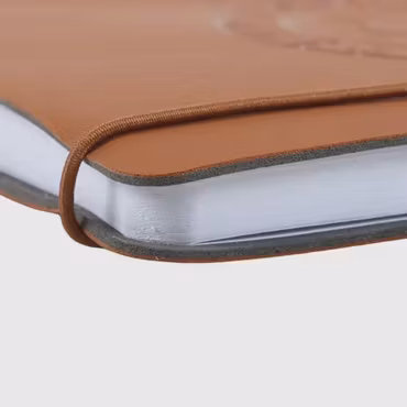 Anteckningsbok i konstläder vegvisir