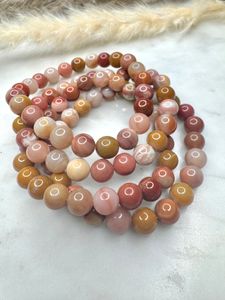 Förstenat trä rosa 8 mm