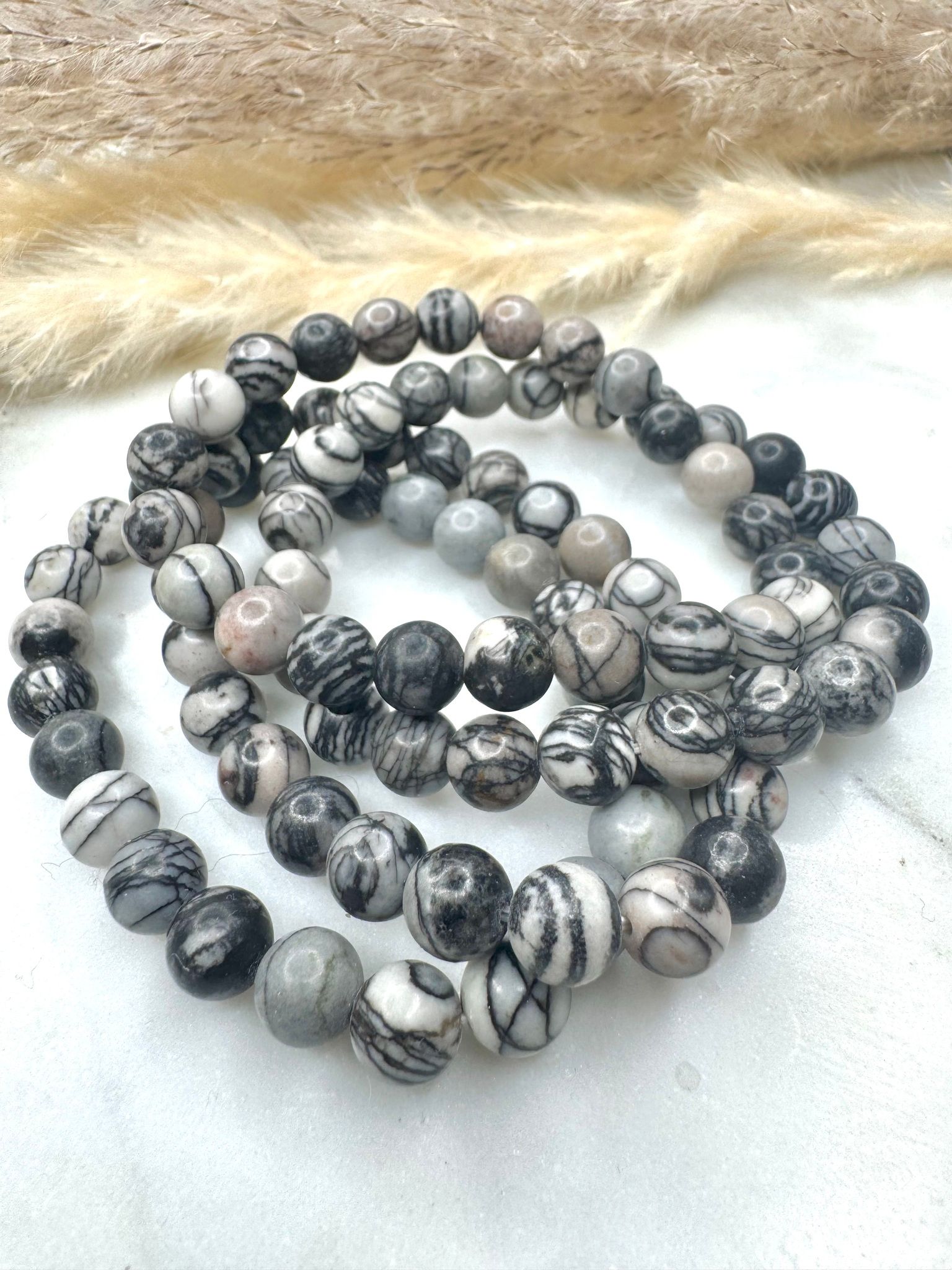 Spindelnatjaspis armband 8mm kristall