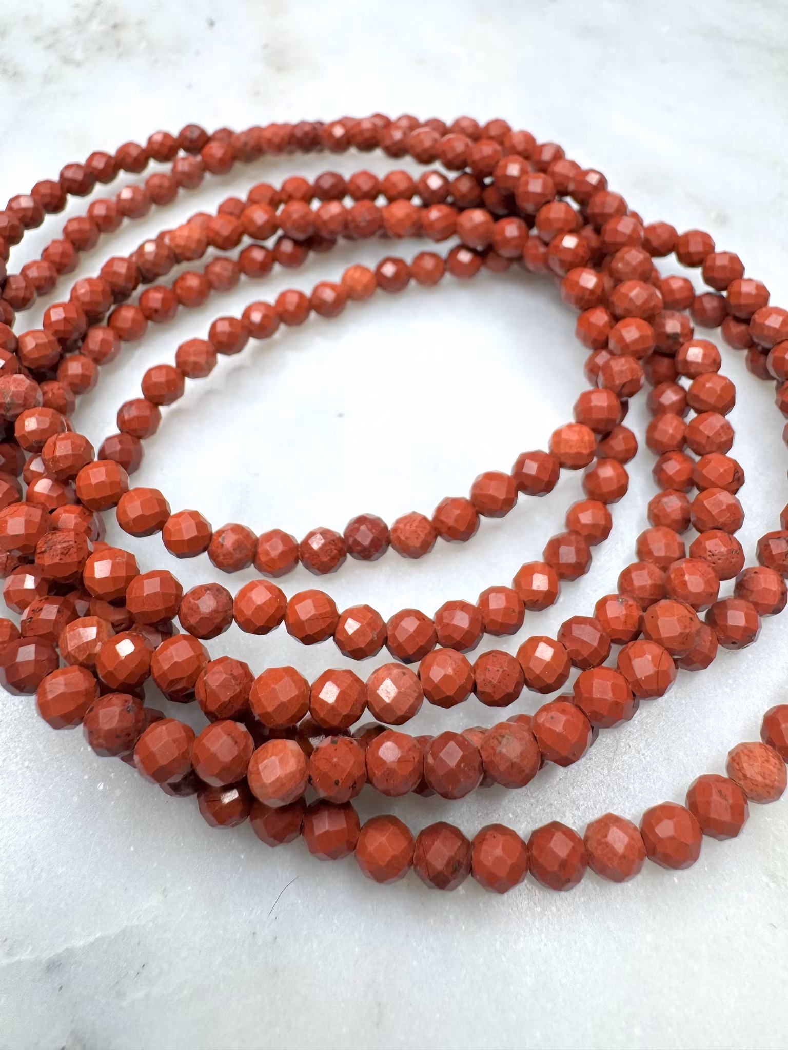 Facetterad röd jaspis 4 mm