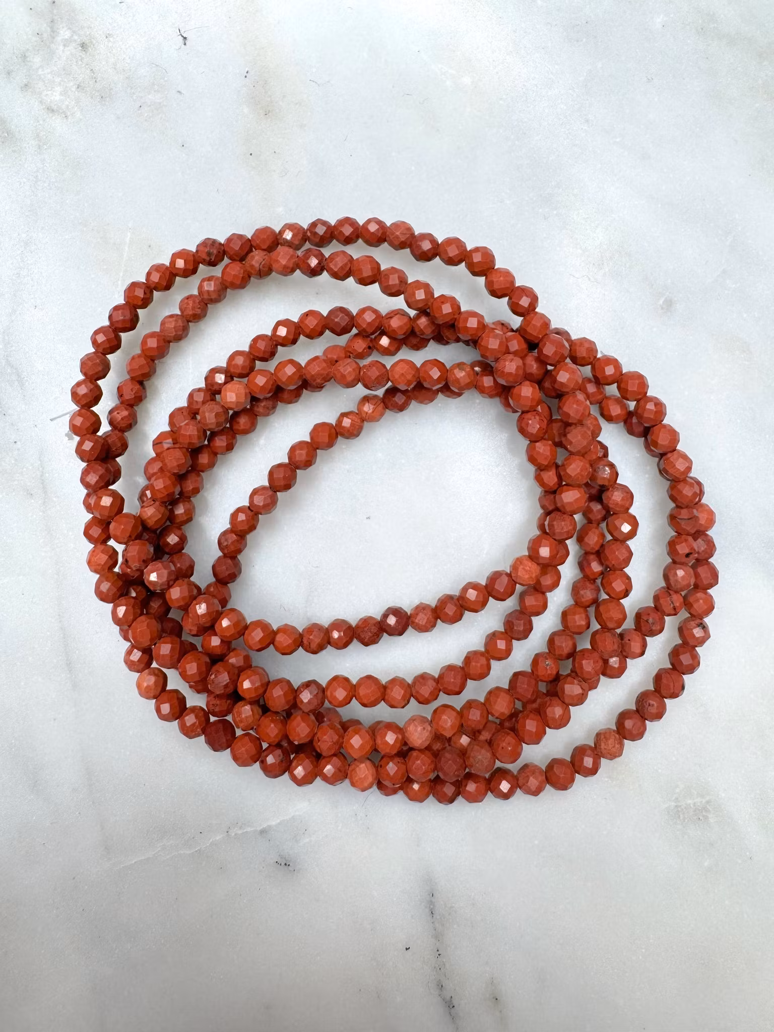 Facetterad röd jaspis 4 mm