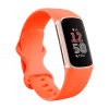 Fitbit Charge 6 aktivitetsarmband Korall/Champagne guld aluminium