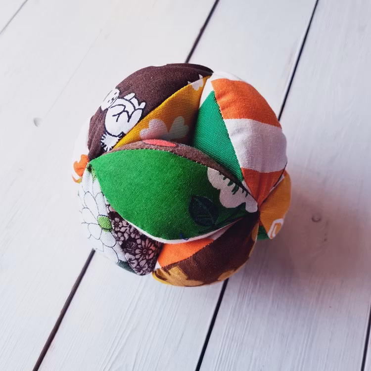 Gripboll orange/brun/gul